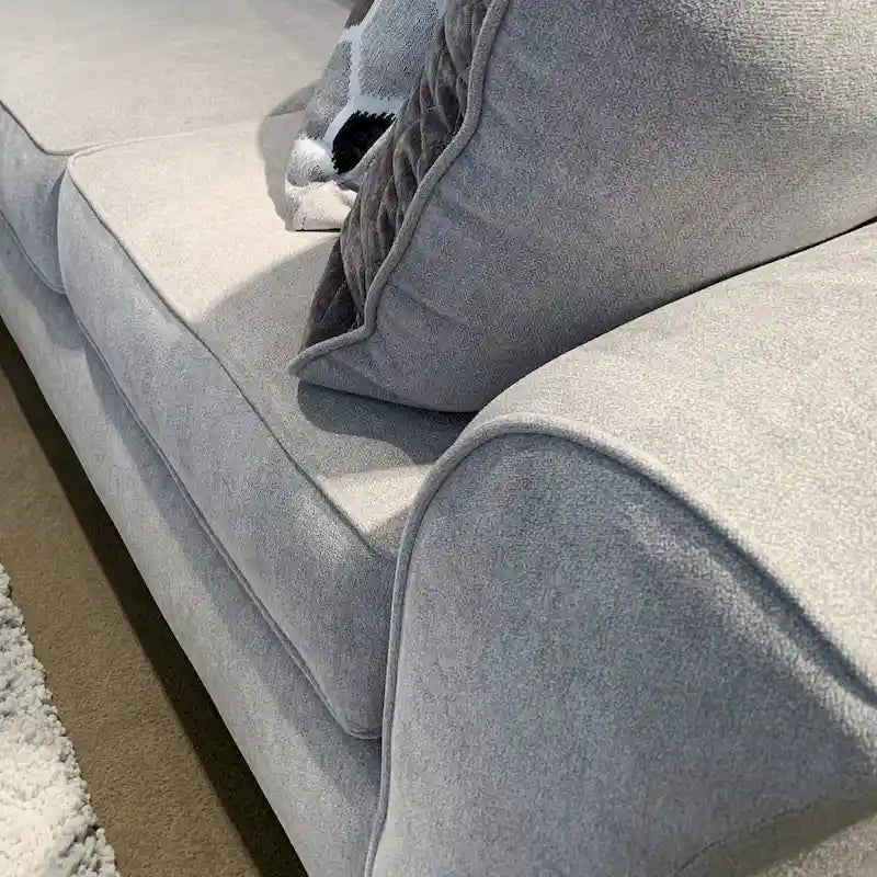 Causeuse en tissu à dossier moelleux